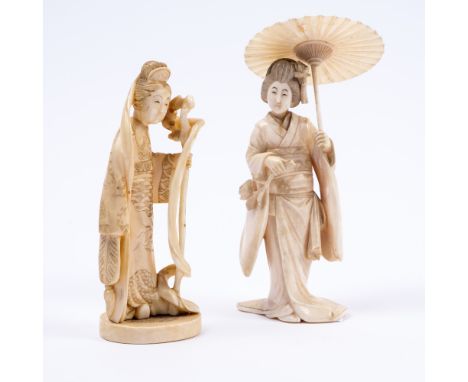 A Japanese ivory okimono carved as a standing Geisha late Meiji holding a sun shade and a peony flower, signed ? Getsu, 14cm 