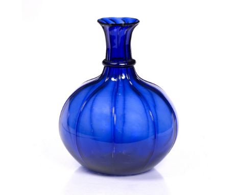 An Indian Mughal Surat blue glass flask 18/19th Century of ribbed form, 21.2cm high