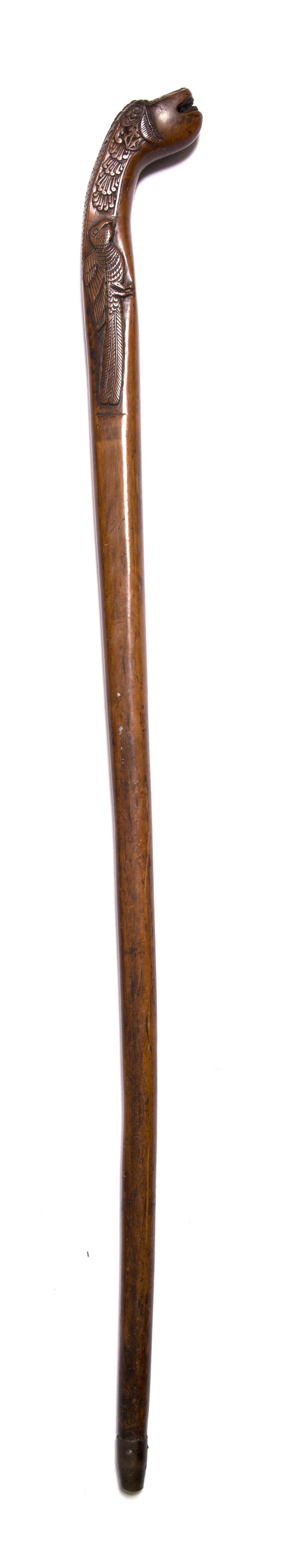 A Sri Lankan fruitwood walking stick 19th Century carved with a makara