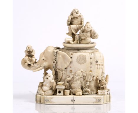 A Japanese ivory and shibayama style inlaid tusk box and cover Meiji period carved as an elephant standing four square upon a