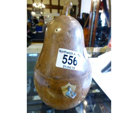 Carved fruitwood tea caddy in the shape of a pear with key and lining