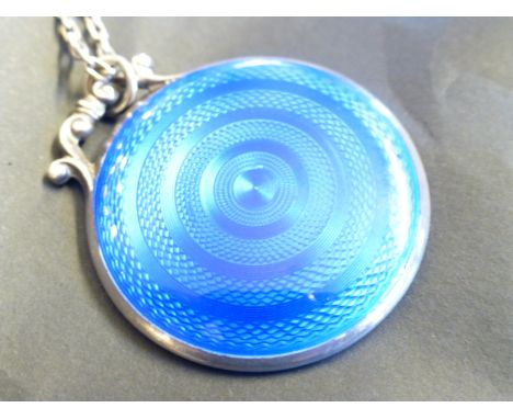 Hallmarked silver guilloche enamel backed mirror pendant.