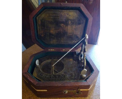 Cased sundial / compass brass in fitted case made by Cox of London