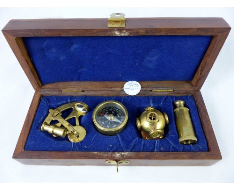 Wooden cased miniature brass compass and nautical instruments - sextant etc