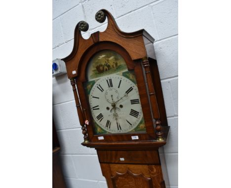 A 19th Century oak cased long case clock having 8 day movement , painted dial, name indistinct