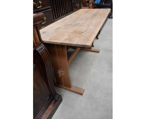 A natural pine kitchen table in the Shaker style