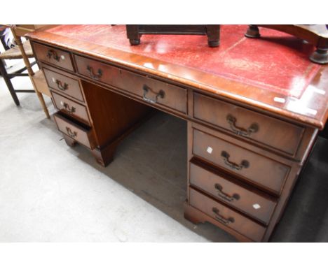 A reproduction Regency pedestal desk, width approx. 137cm