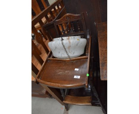 A vintage childs stained frame high chair and marble effect glass light shade