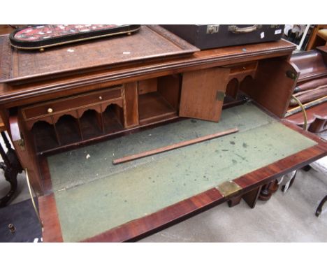 A late George III string inlaid mahogany secretaire chest, the rectangular top with reeded edge detail above the deep secreta