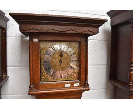 An 18th Century oak cased long cased clock having square hood, 30 hour movement and brass dial, named for Wm Bachelor, Lindfi