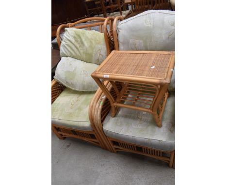 A pair of modern bent wood conservatory arm chairs with side table