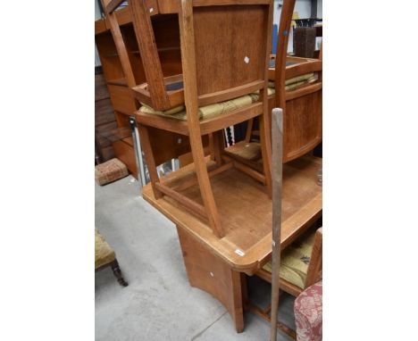 An Art Deco light oak drawer leaf dining table and six chairs, in the manner of Heals (unmarked)