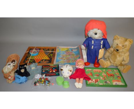 A good mixed lot of vintage toys including two bears, one dressed as 'Paddington' carrying a vintage plastic Doctors Bag, a V