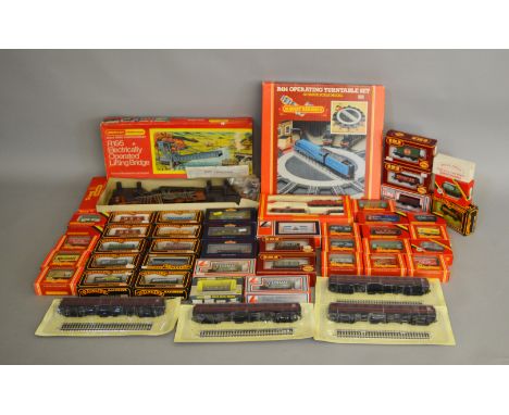 OO Gauge. 44 boxed items of Rolling Stock by Hornby, Lima, Bachmann and others including a Hornby R.197 75ton Operating Break