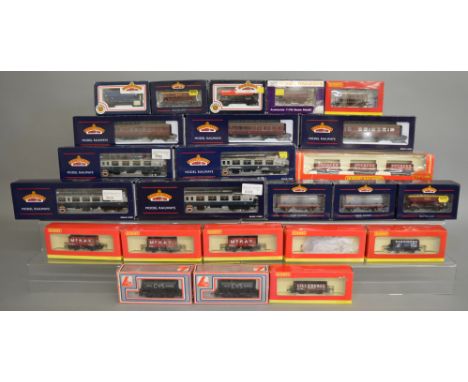 OO Gauge.&nbsp; 7 boxed Bachmann Coaches together with 16 boxed Wagons of various types by Hornby, Dapol, Bachmann etc. inclu