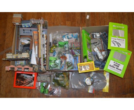 N Gauge. A quantity of trackside buildings of plastic and card construction together with other trackside accessories, some i