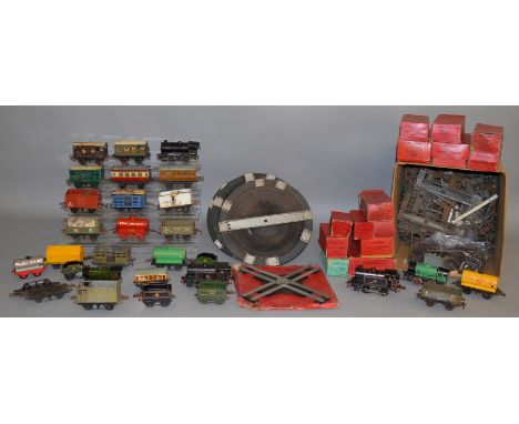 O Gauge. A good quantity of Hornby Railway items including 6 Locomotives, one boxed , 5 Tenders, one boxed, 20 unboxed Wagons