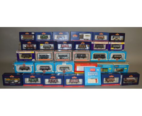 OO Gauge. 31 boxed Wagons including 16 by Bachmann, 5 by Airfix, 6 Dapol, 1 Hornby and three Peco wagon kits. Condition of it