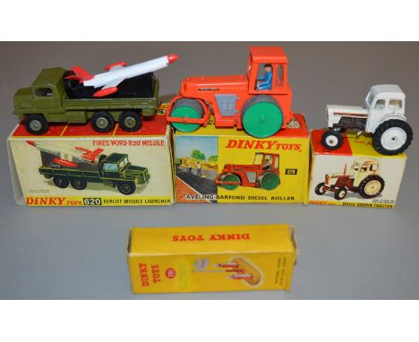 2 boxed Dinky Toys 279 Road Roller and 305 David Brown Tractor, both G although the #305 model is missing its exhaust in F/G 