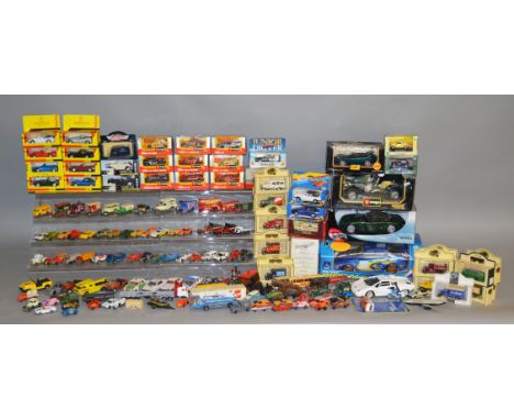 A boxed Nikko Subaru Imprezza WRC model in 1:16 scale together with two 1:18 scale diecast model cars by Hot Wheels and Bbura