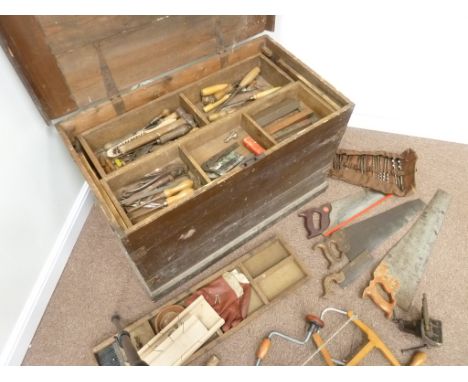 Collection of hand tools including - chisels, hand saws, metal and woodworking hammers, hand drills, twist drill bits in roll