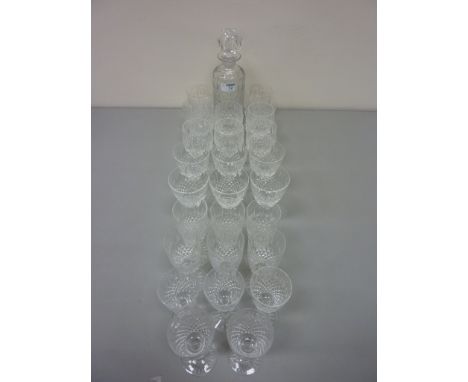 Suite of cut crystal drinking glasses with matching decanter