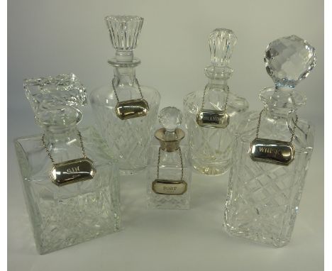 Liqueur decanter with hallmarked silver collar and four cut glass decanters, together with five hallmarked silver decanter la