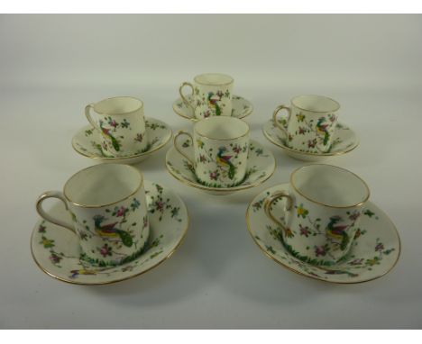 Set of six Crown Staffordshire coffee cans and saucers decorated with exotic birds and foliage