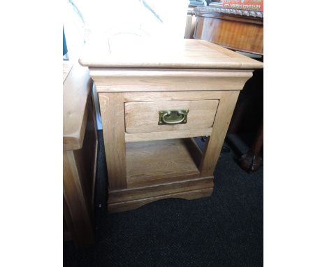 A modern light oak occasional table/drawer unit