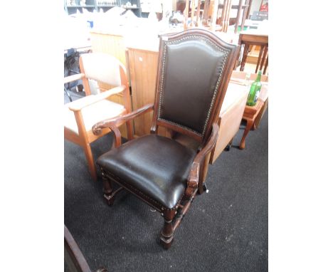 A 20th century period style leather button armchair
