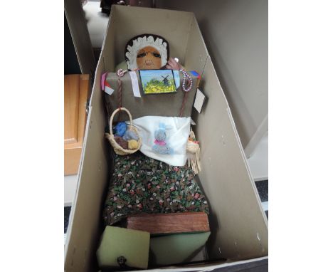 A vintage doll with treen head