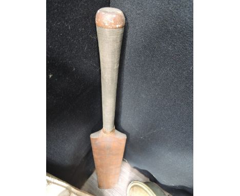 A vintage cricket bat by Walter Lambert and Sons