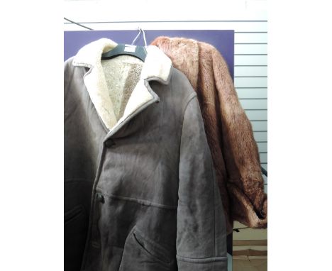 A gents grey sheepskin coat and a ladies vintage short coney fur jacket