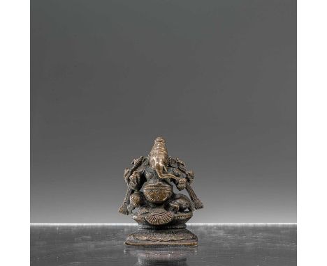 Dimension: Height 6,6 cm ; Wide 5,3 cm ; Depth 3,4 cmWeight: 224,3 grams  Four armed Lord Ganesha seated , his upper right ha