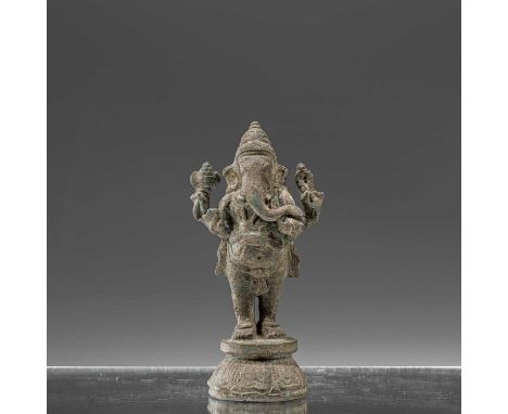 Dimensions: Height 14,5 cm ; Wide 7 cm ; Depth 5 cmWeight: 448 grams Four armed standing Ganesha standing above a circular lo