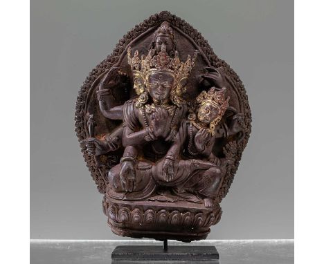Dimensions: Height 18 cm ; Wide 14,5 cm ; Depth 5,5 cmWeight: 849,5 grams We have only seen one other Nepalese stone stele of