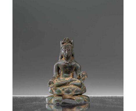 Dimension: Height 11,8 cm ; Wide 8 cm ; Depth 5,5 cmWeight: 449,3 grams The handsome Swat Maitreya exhibits some characterist