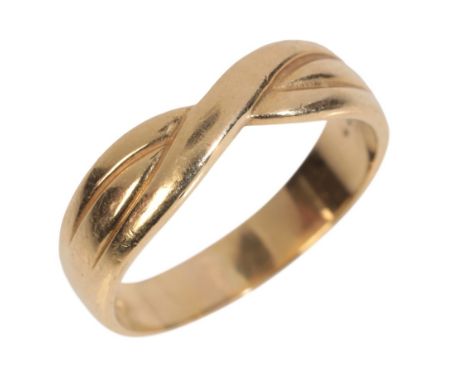 AN 18CT GOLD RINGwith a twisted design, ring size M, stamped '750' (c.3.74g gross weight)