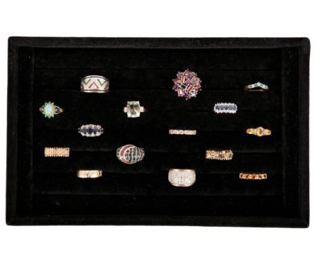A COLLECTION OF FIFTEEN GEM-SET GOLD RINGSincluding a wide diamond set 9ct gold band; two sapphire and diamond 9ct boat rings