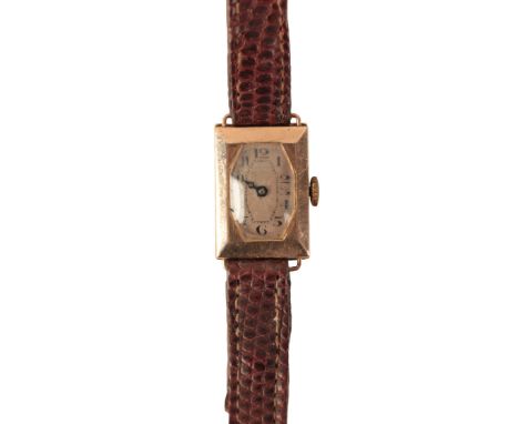 A LADY'S 9CT GOLD WRISTWATCHwith manual wind movement, the silver dial with black Arabic numerals and dark blue steel hands, 