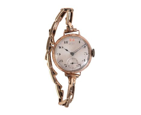 ROLEX: A GENTLEMAN'S 9CT GOLD WRISTWATCHwith manual wind movement, the silver dial with subsidiary seconds dial, black Arabic