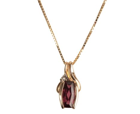 A TOURMALINE AND DIAMOND PENDANT NECKLACEof mid-century style, the cushion cut tourmaline in a 14ct gold setting, on a 14ct g