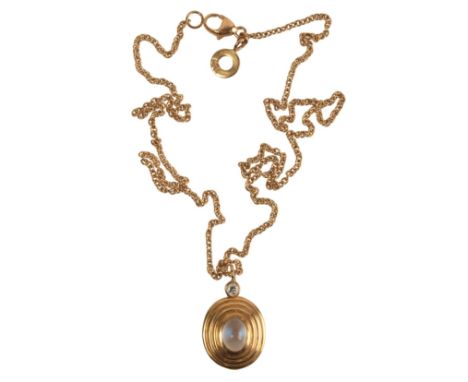 A MOONSTONE AND DIAMOND OVAL PENDANT NECKLACEthe central cabochon moonstone c.0.5 carats, below a small diamond c.0.05 carats