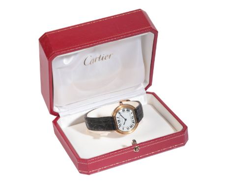 CARTIER ELLIPSE: AN 18CT GOLD WRISTWATCHwith manual wind movement, the white dial with black Roman numerals and dark blue ste