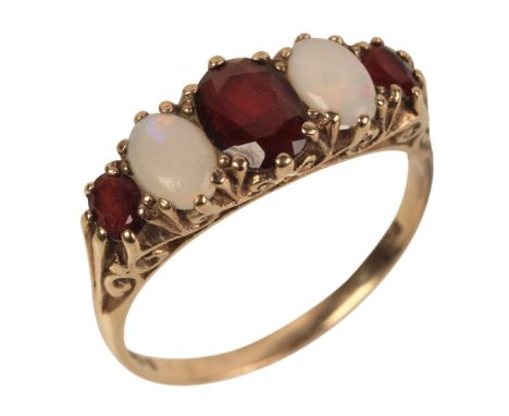A 9CT GOLD GARNET AND OPAL FIVE STONE RINGset with alternating oval cut garnets and opals, the head of the ring measuring app