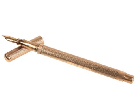 A 9CT GOLD CASED FOUNTAIN PENwith engine turned decoration, stamped '375' to lid, approx. 14.5cm long, approx. 10mm diameter 