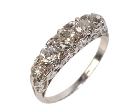 AN ANTIQUE FIVE STONE DIAMOND RINGset with five old European cut diamonds, c.1.20 carats total weight, in an 18ct white gold 
