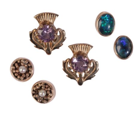 A PAIR OF 9CT GOLD AMETHYST THISTLE EARRINGSmeasuring approx. 1cm x 1.5cm; together with a pair of 9ct pearl set earrings; an