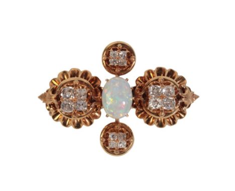 AN OPAL AND DIAMOND BROOCHthe central white opal claw measuring approx. 9.45mm x 6.90mm, set amidst four sets of four round a