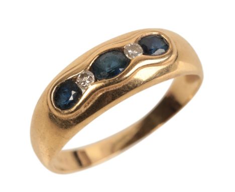 AN 18CT GOLD SAPPHIRE AND DIAMOND RINGset with three oval cut sapphires and accented by two round brilliant cut diamonds, rin